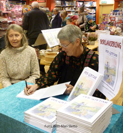Anne-Mari-og-Eva-signerer-bøker